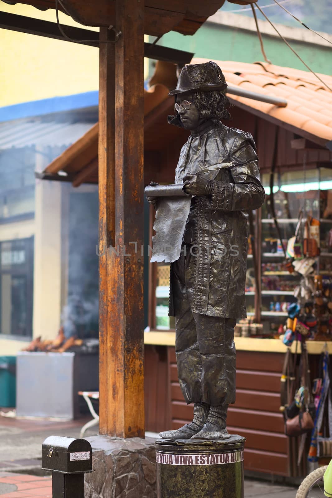 Living Statue at the Pasaje Artesanal in Banos, Ecuador by sven