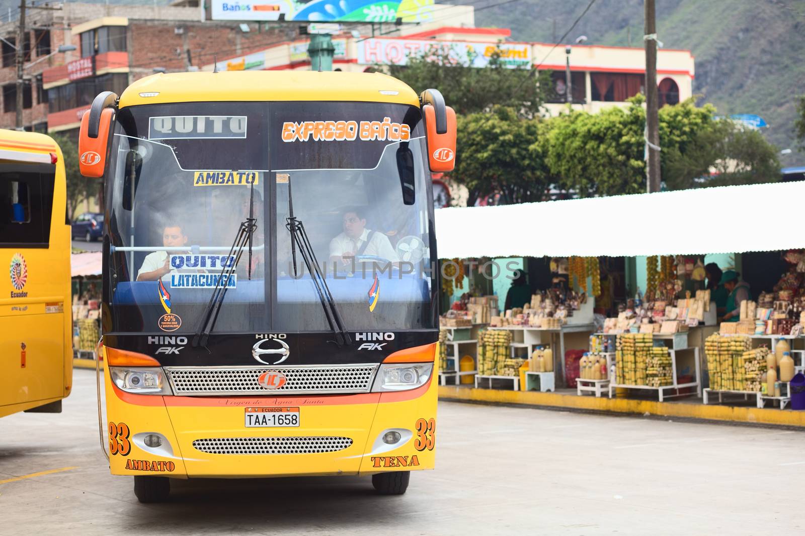 Bus Leaving Bus Terminal in Banos, Ecuador by sven