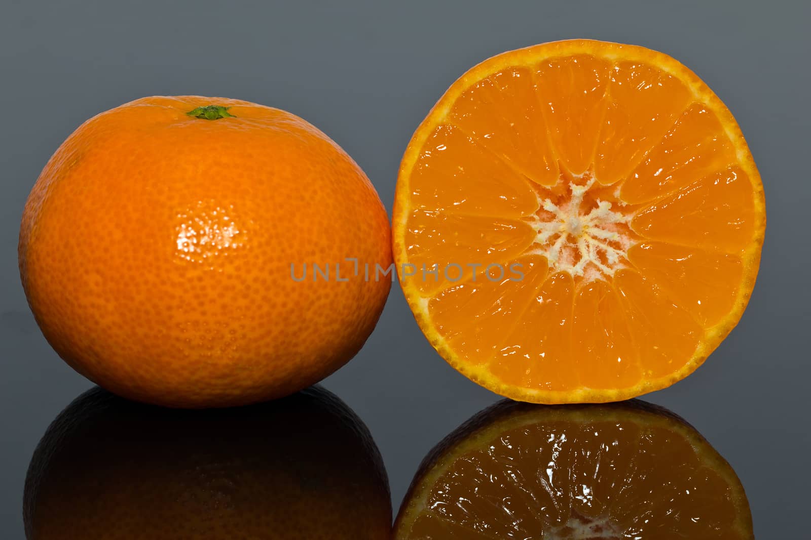 isolated mandarine on dark background