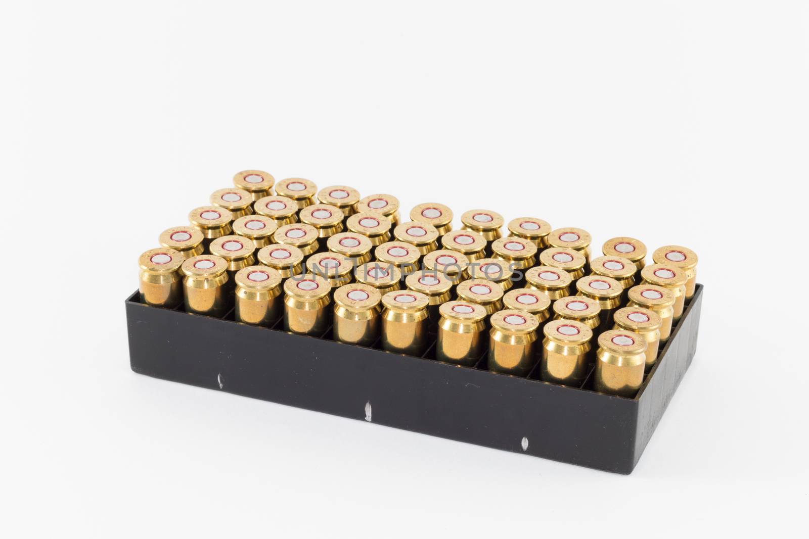 Pack of  45 caliber cartridges against light background