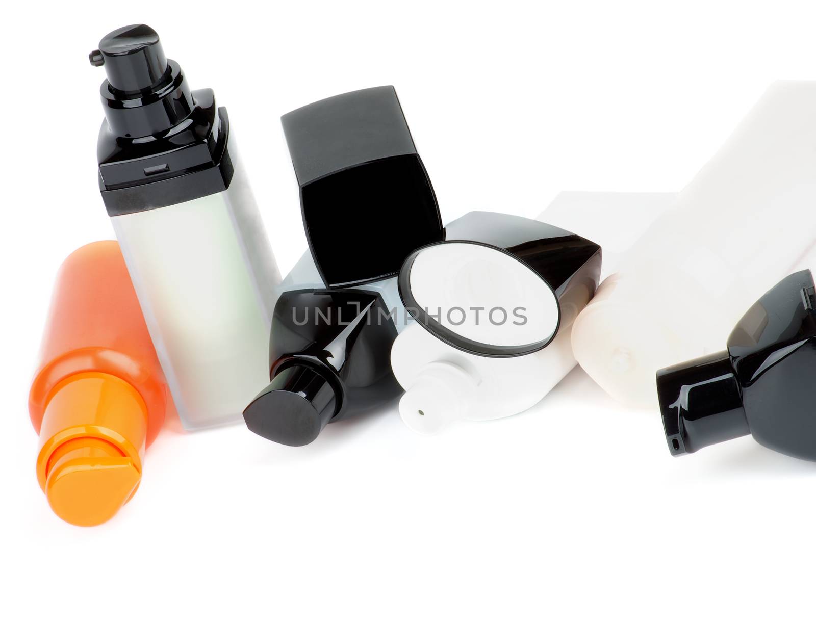 Arrangement Facial Cosmetics Containers with Cleanser, Moisturizer and Care Creams isolated on white background