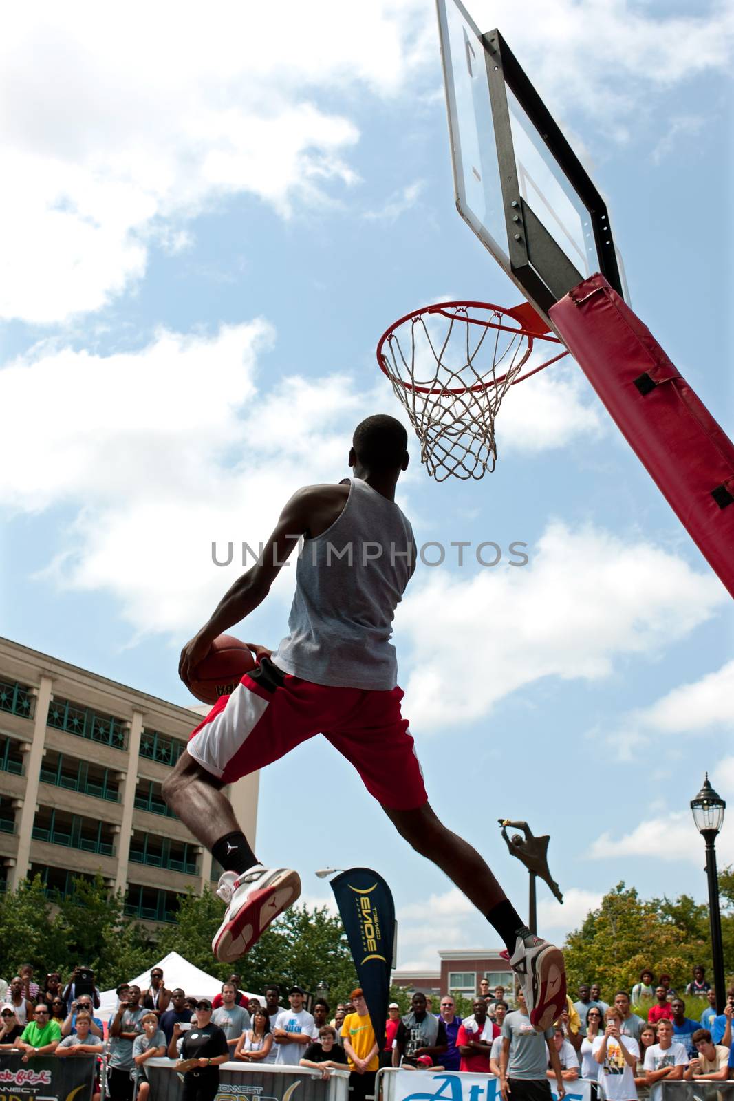 Man Attempts Reverse Jam In Outdoor Slam Dunk Competition by BluIz60