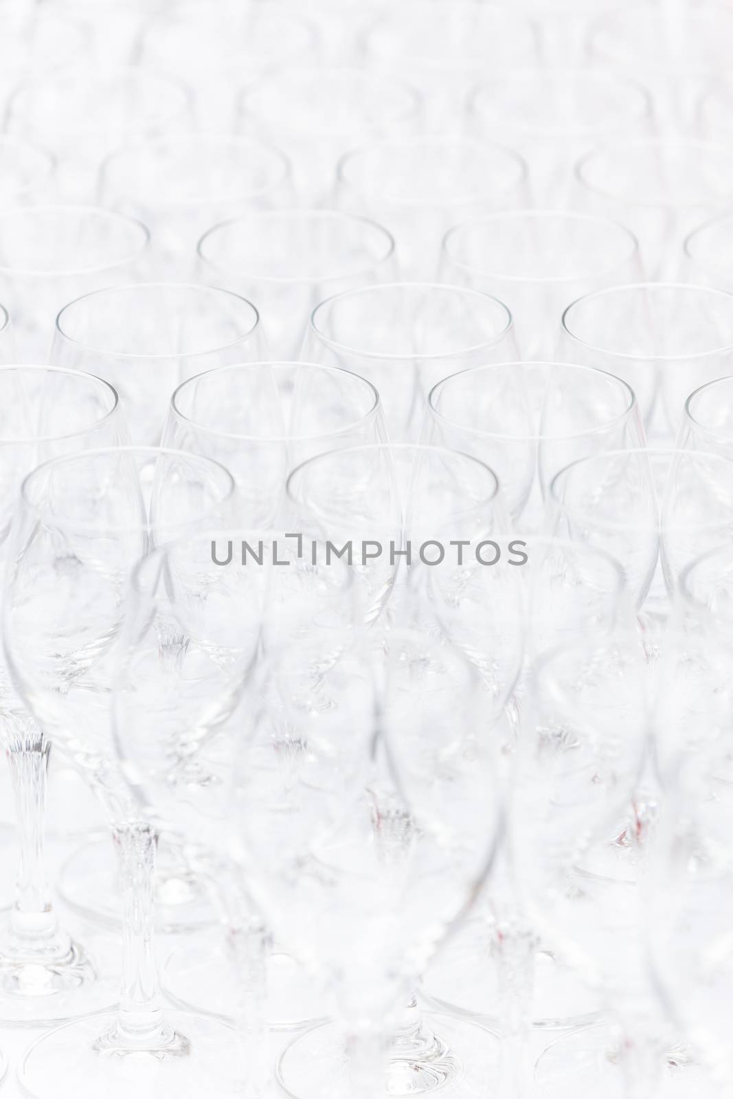 Background pattern of empty christal glasses. Banquet event.