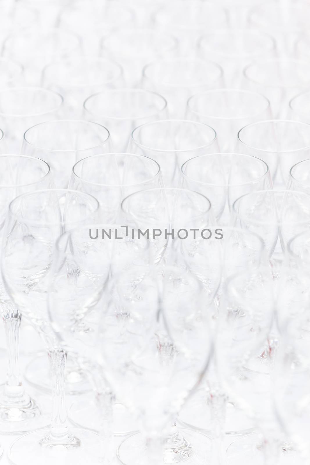 Background pattern of empty christal glasses. Banquet event.