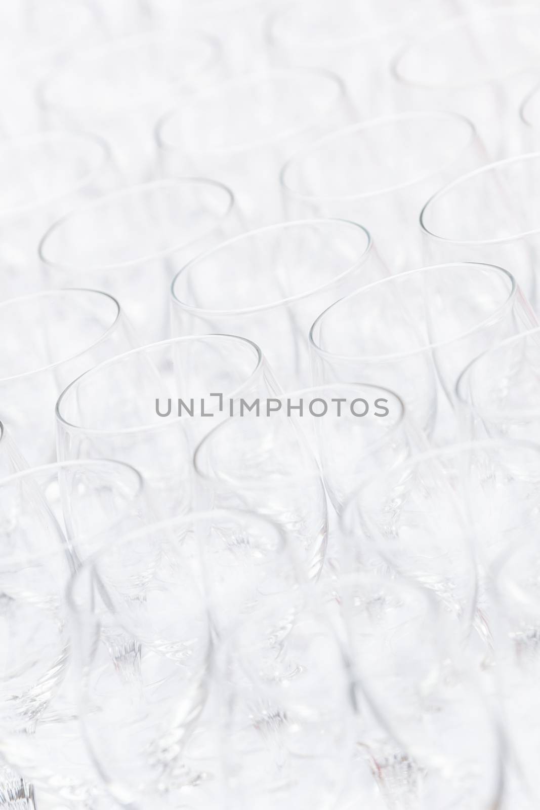 Background pattern of empty christal glasses. Banquet event.