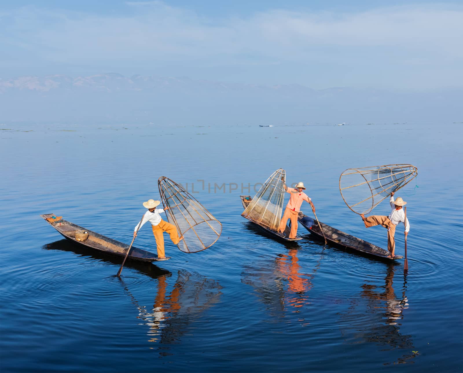 Burmese fishermen at Inle lake, Myanmar by dimol