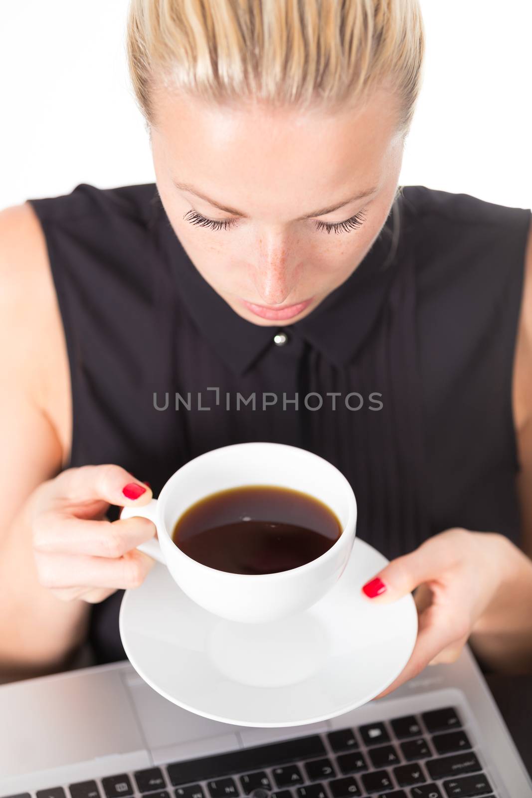 Business woman with cup of coffee. by kasto
