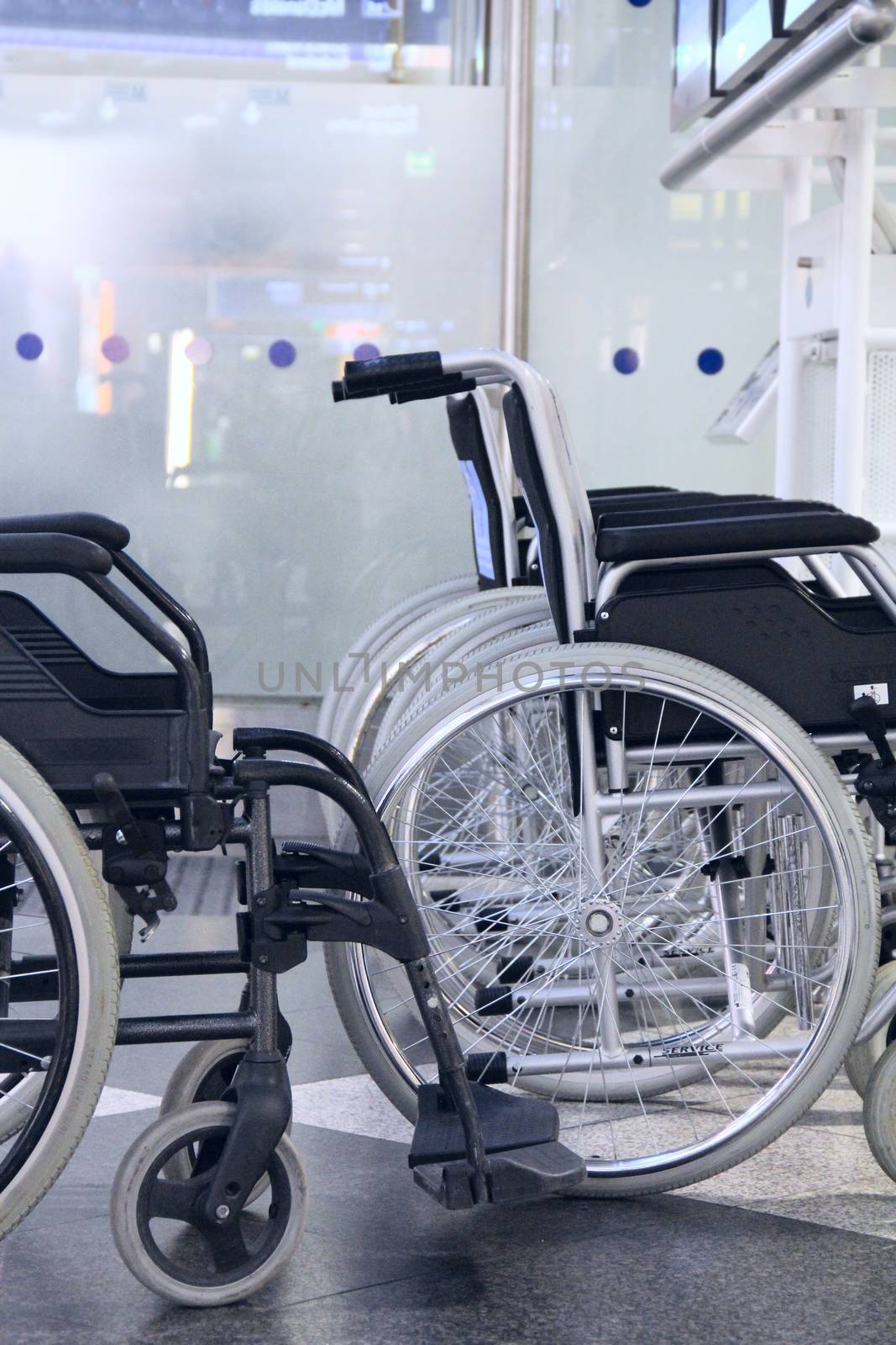 Photo of public wheelchairs in airport close-up