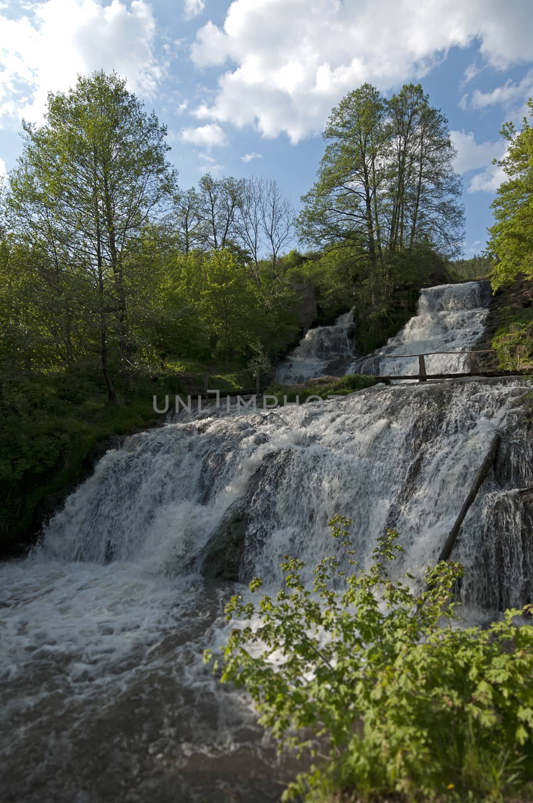 Powerful Dzhurynsky (Chervonohradsky) waterfall, Ternopil region, Ukraine