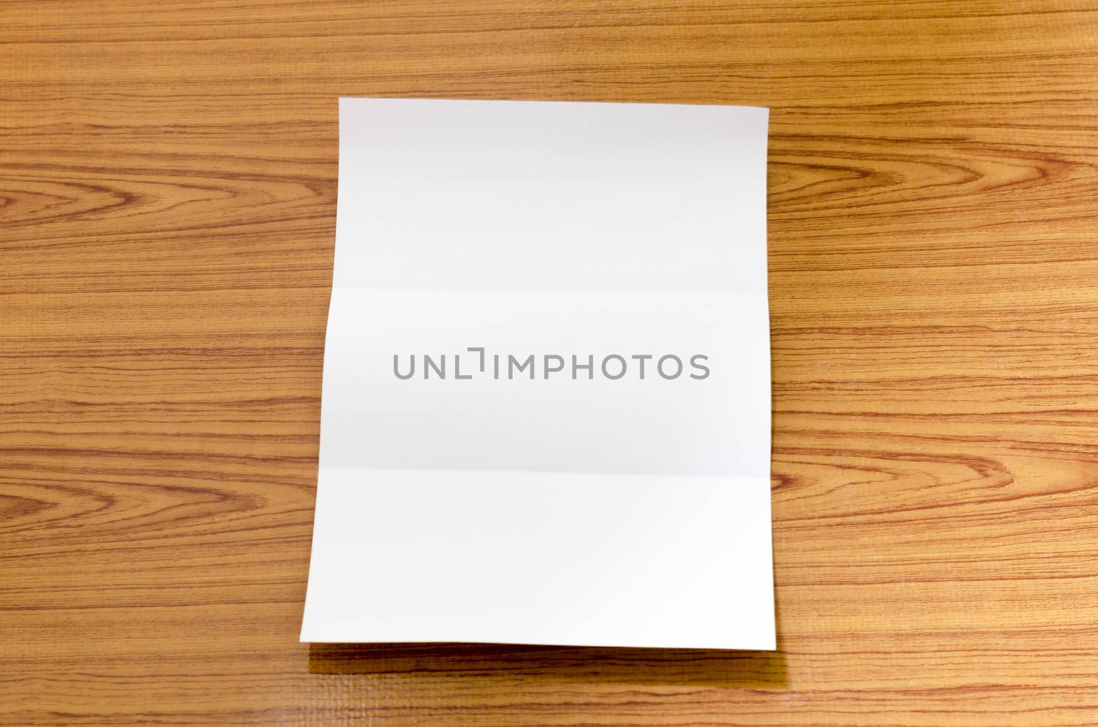 paper on wood background