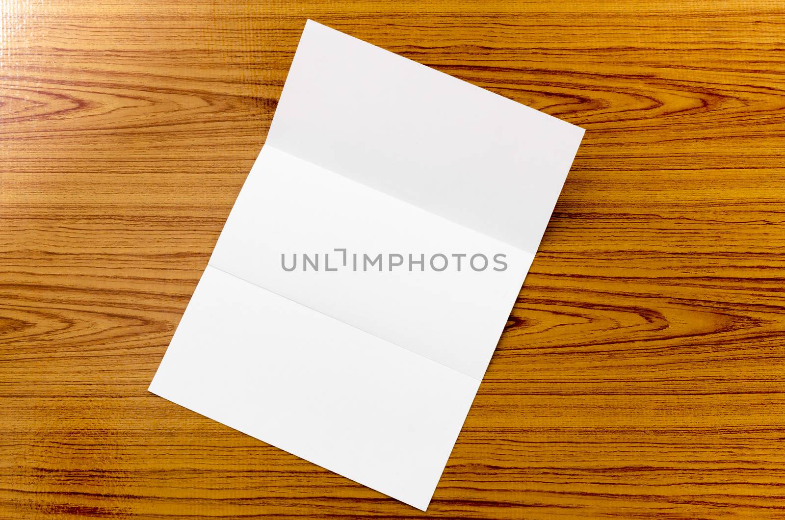 paper on wood background