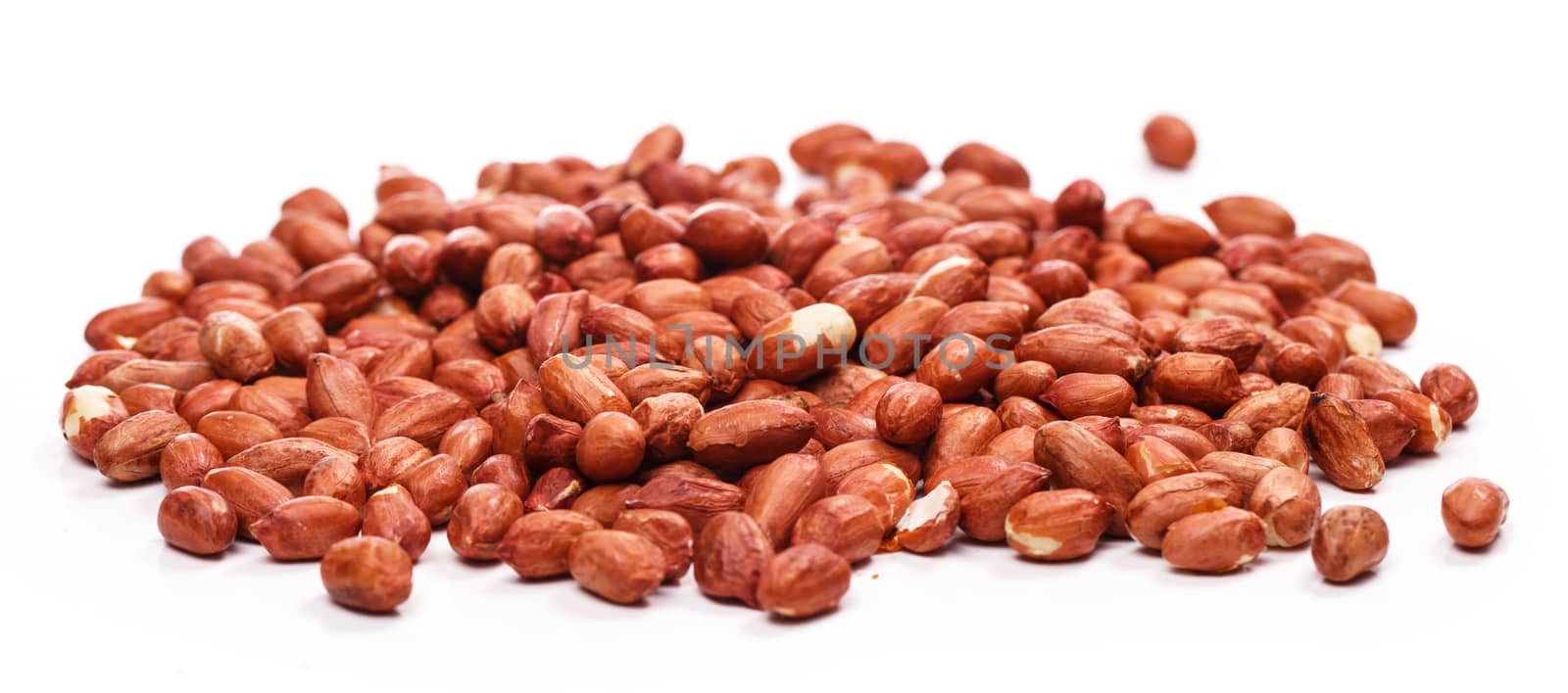 Delicious peanuts on a white background