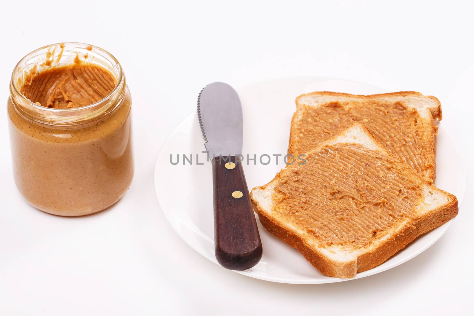 Delicious peanut butter on the table by rufatjumali