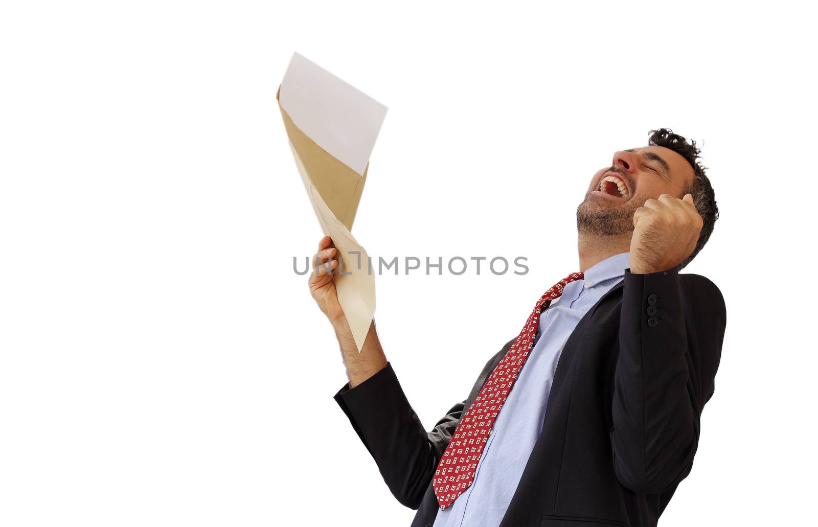 Man reacting with jubilation to a letter punching the air with his fist and cheering at his success, isolated on white