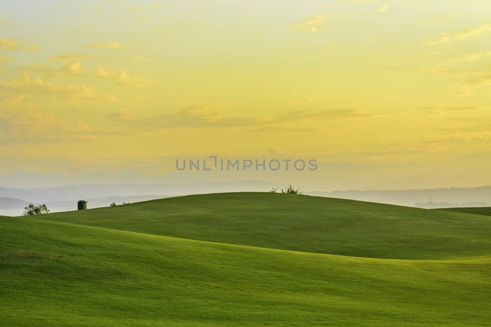 Golden sunrise on golf greens, Philippines