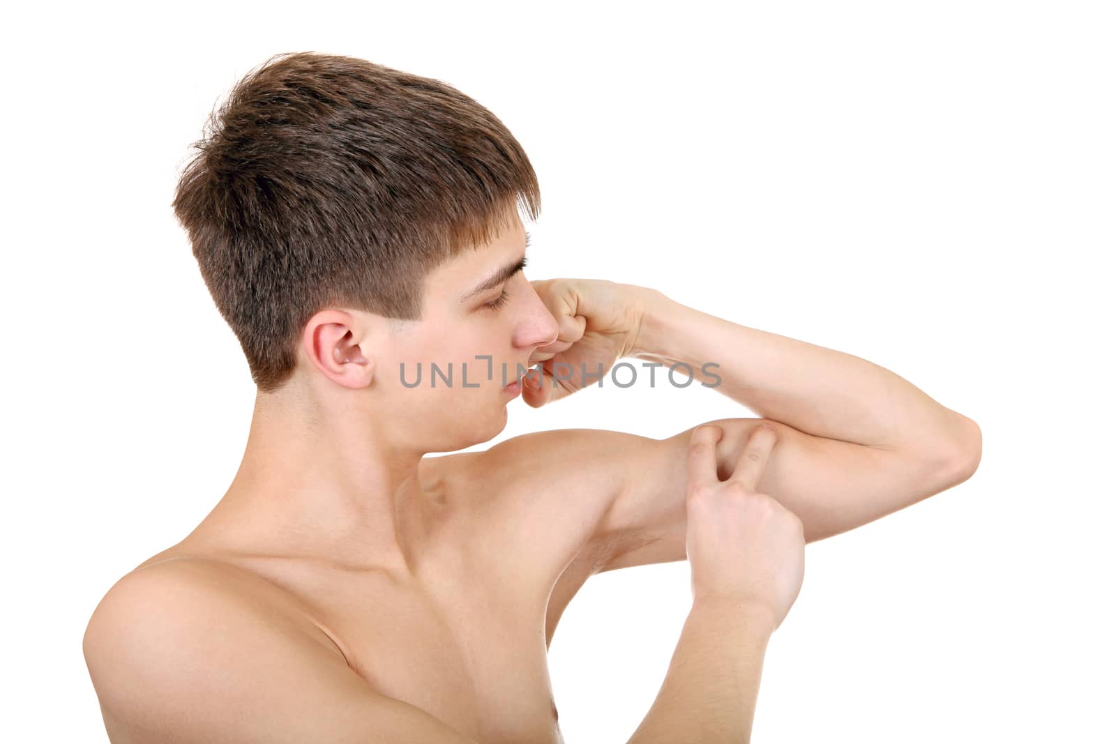 Handsome Teenager Muscle flexing Isolated on the White Background