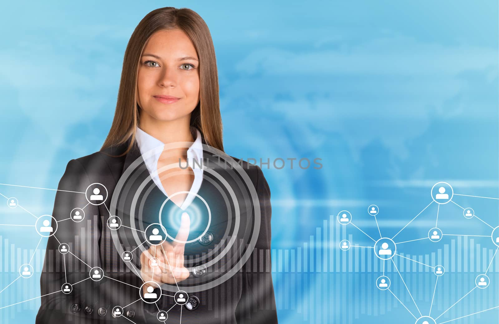 Beautiful businesswoman in suit finger presses virtual button. Graphs as backdrop