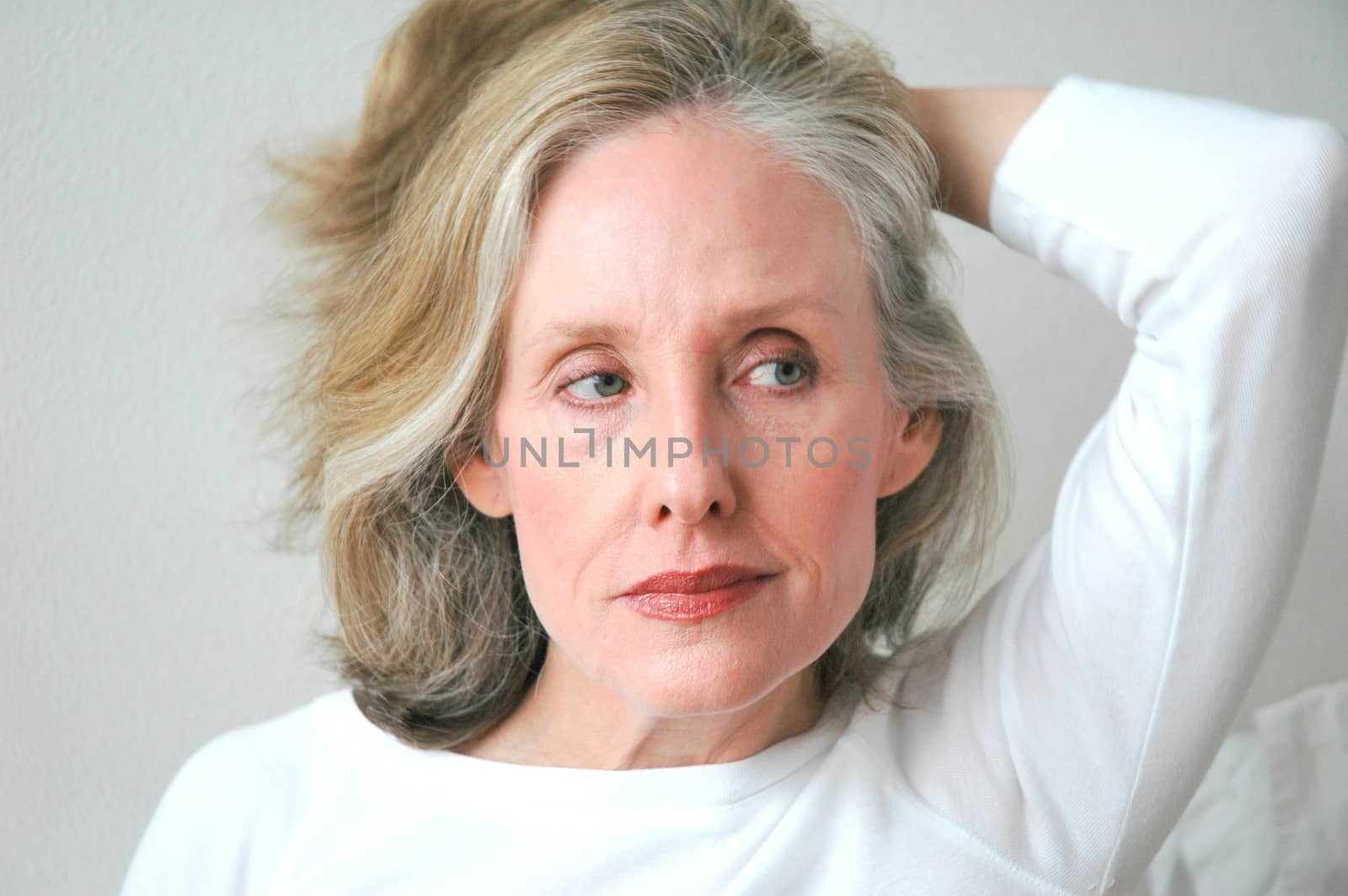 Mature female beauty expressions indoors.
