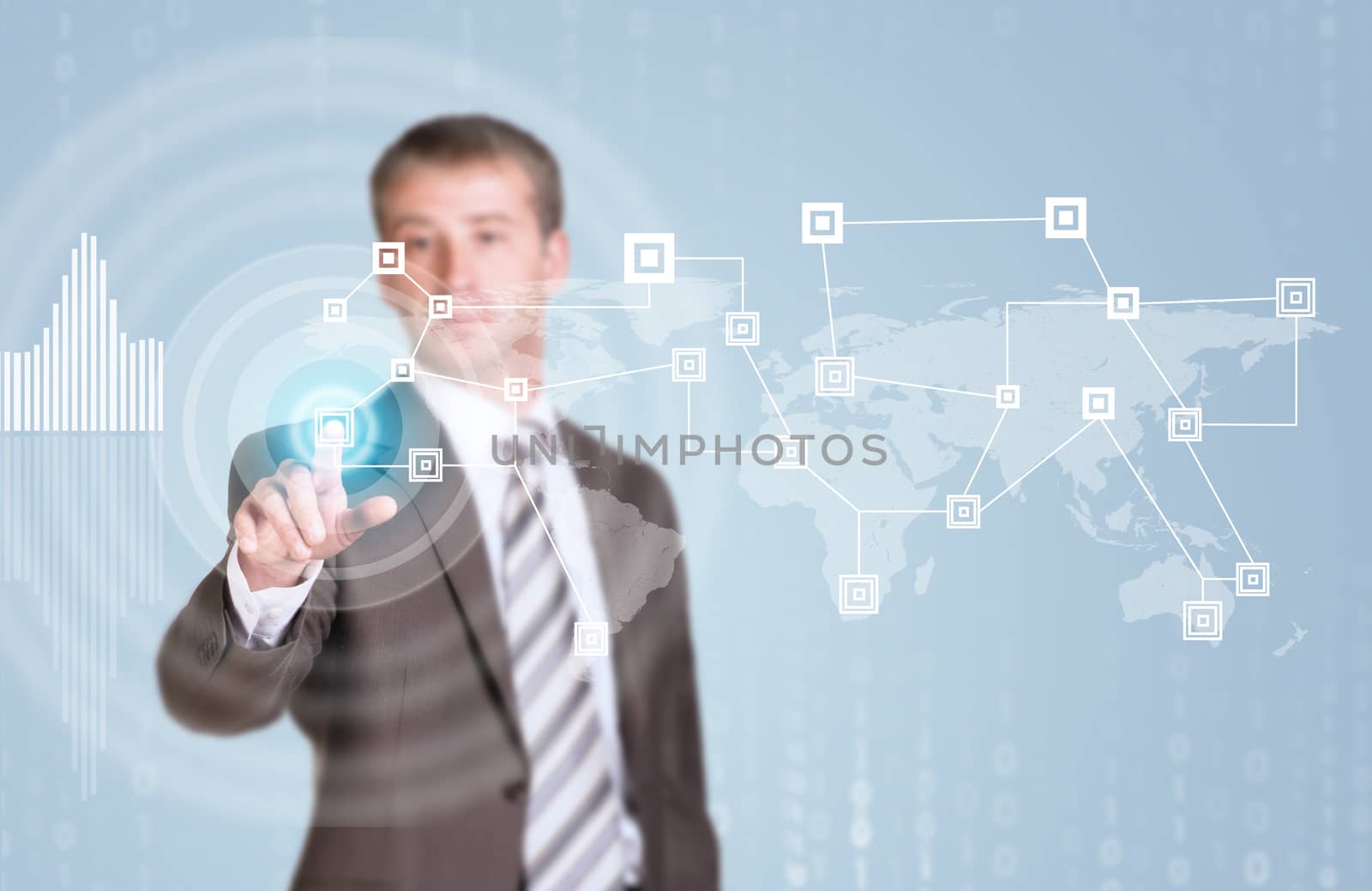 Businessman in suit finger presses virtual button. Network, graphs, circles and world map as backdrop
