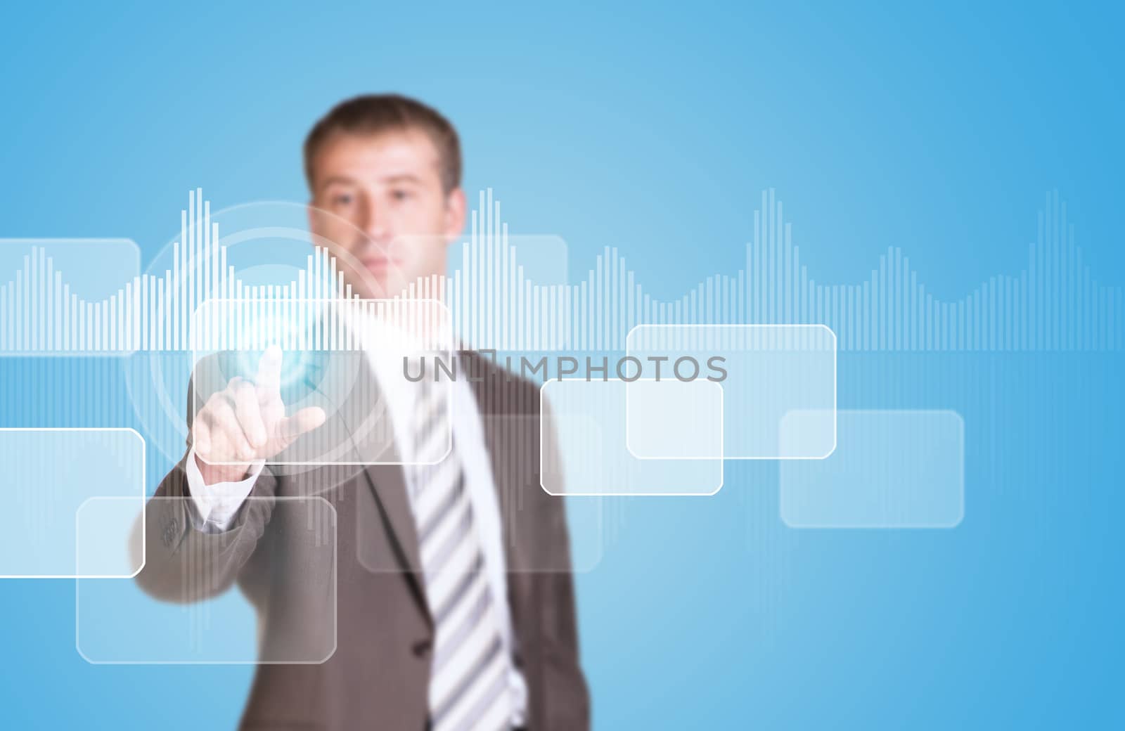 Businessman in suit finger presses virtual button. Graphs and circles as backdrop