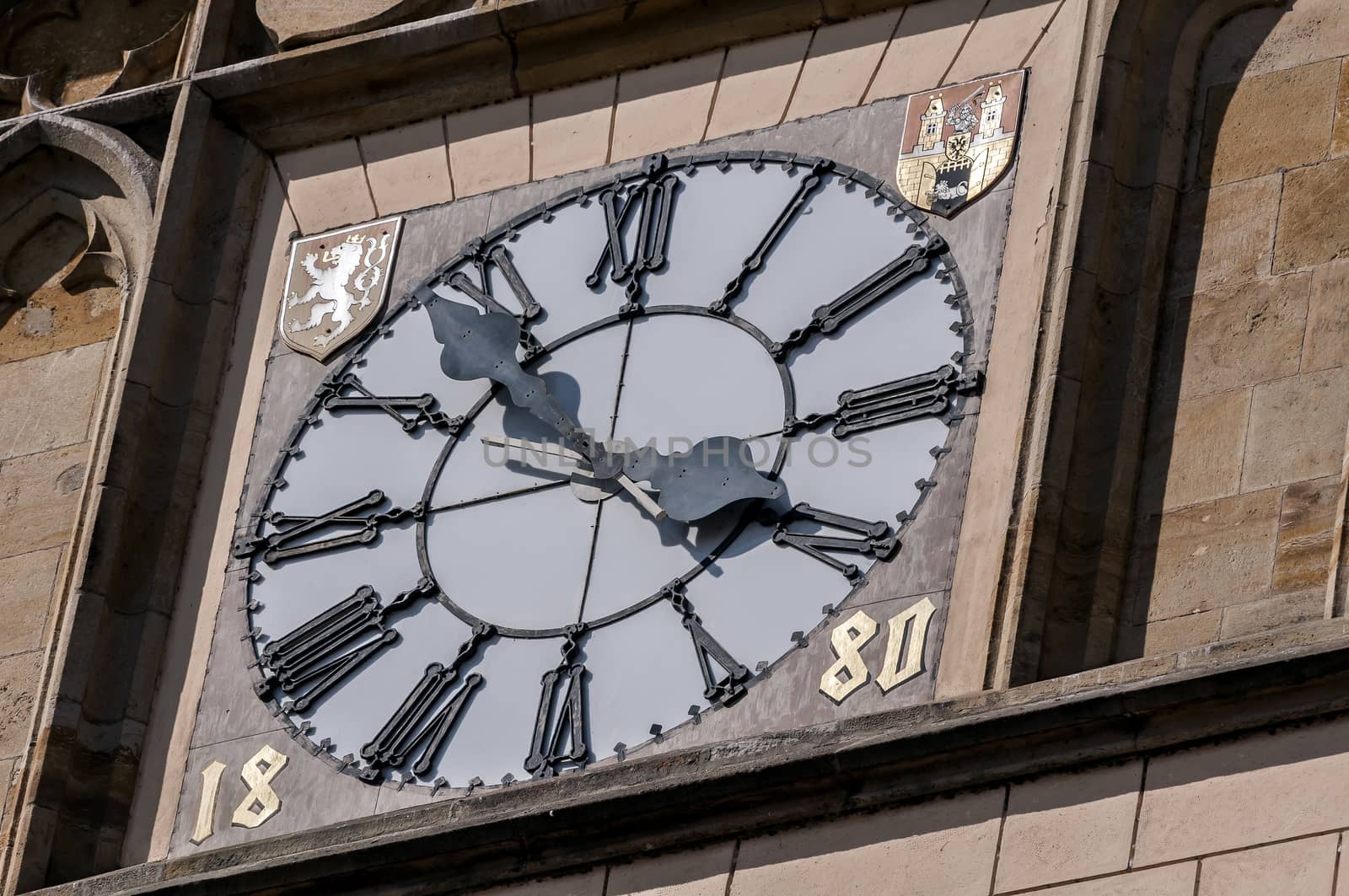 Tower clock in the Old Town of Pragie, Czech Republic.