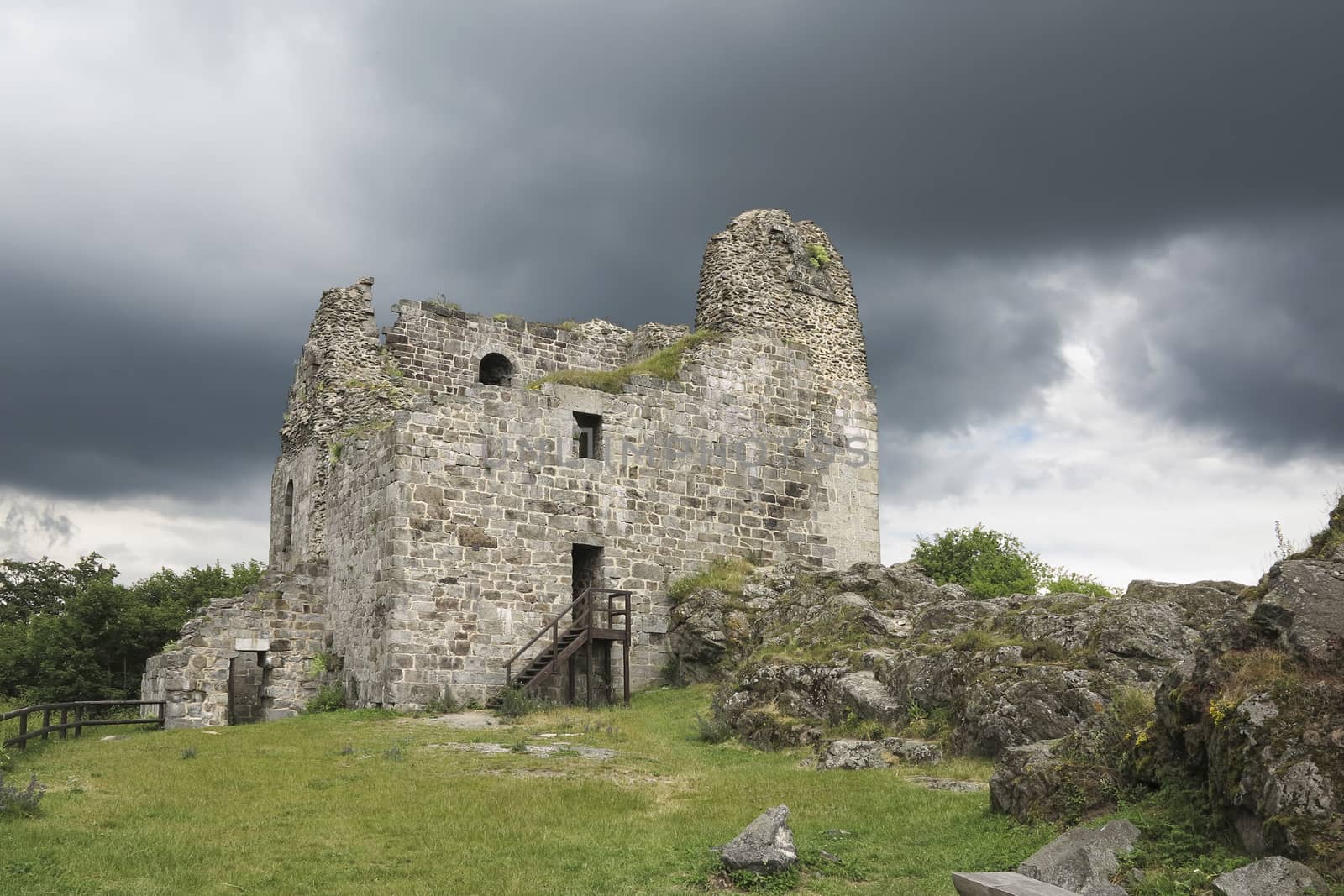 Primda castle - the one from the oldest stone castles in Czech republic.
The first mention of Primda castle dates from the year 1121.
The ruins of the castle Primda stands at the southern end of the rocky ridge above the Primda village on Tachov Region. Primda is considered to be the oldest surviving stone castle in Bohemia and is protected as a national monument. The castle has been preserved ruins of a massive rectangular Romanesque residential tower, which was built of quarried stone. Also there are remains of a cylindrical tower from the late 15th century.
Primda, Czech republic.