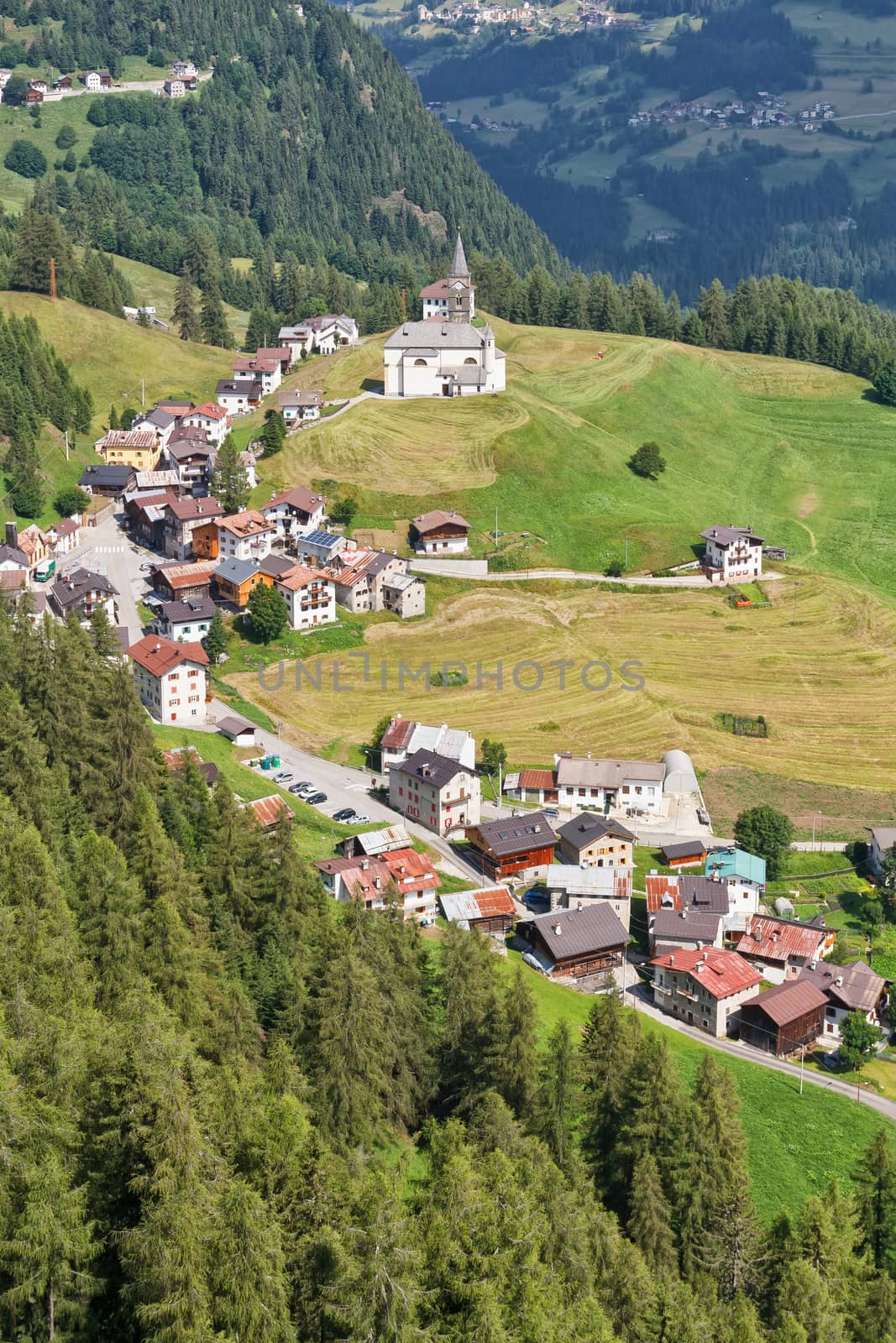 aerial view of Laste village and Cordevole valley from Sass de Rocia, Italian Dolomites