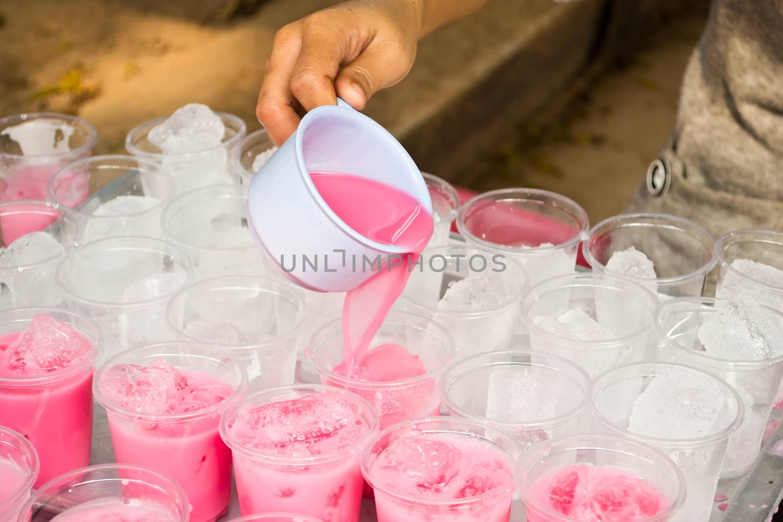 Soft drinks in plastic cups