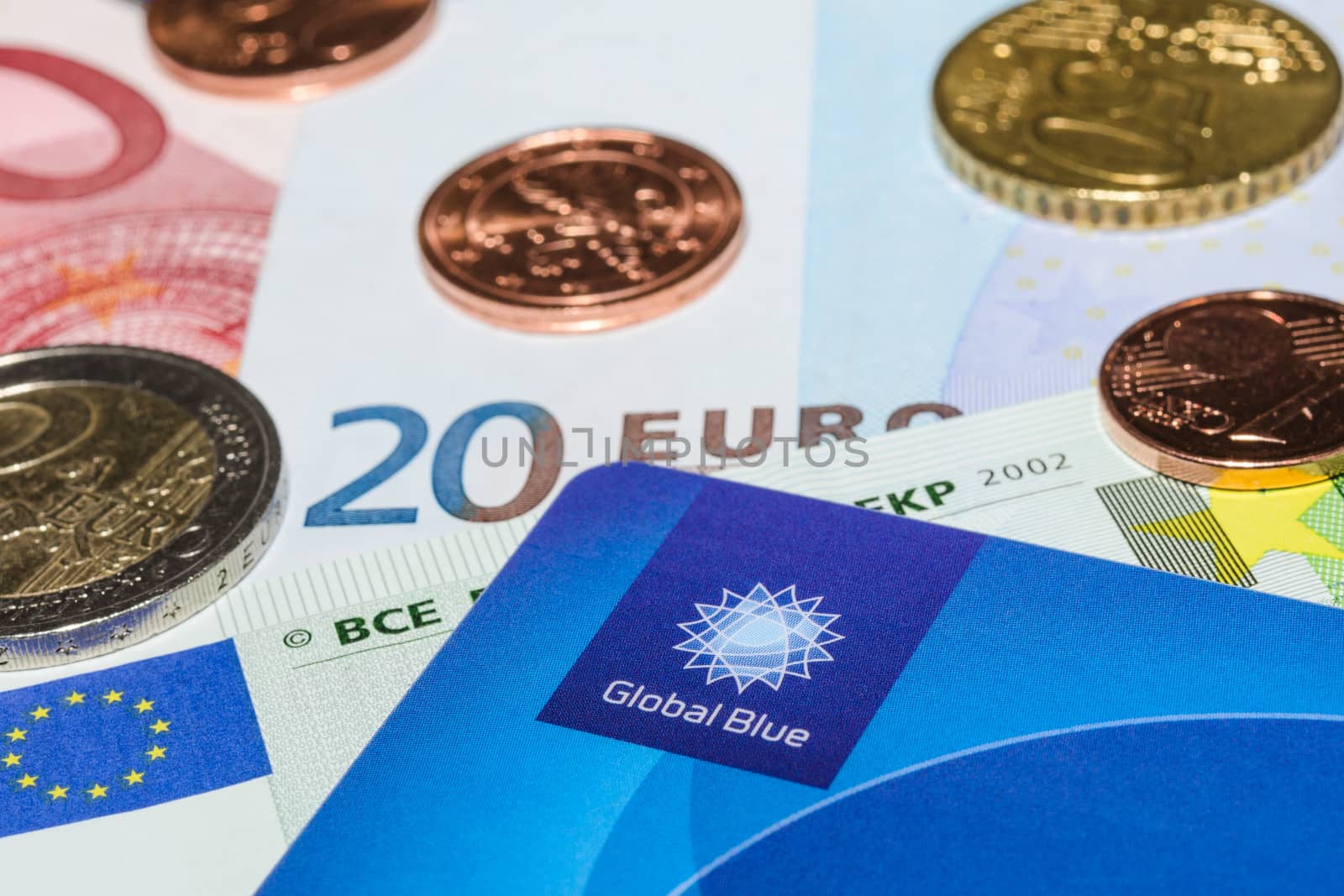 MUNICH, GERMANY - FEBRUARY 23, 2014: Tax Free plastic card from company Global Blue on banknotes