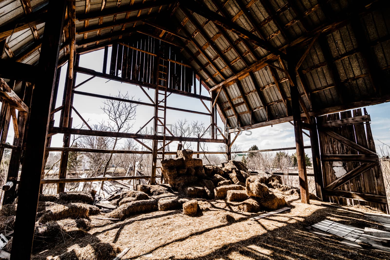 Old Abandoned Barn and Haystack and destroyed walls