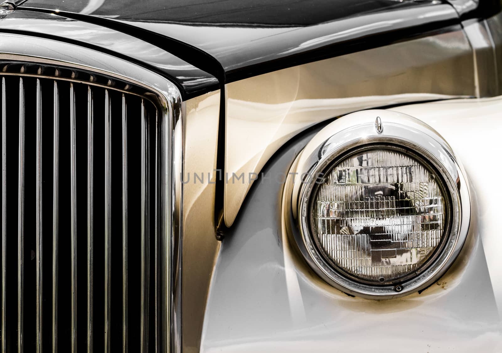 Shiny Antic Silver and Gold Limousine Closeup of the Front