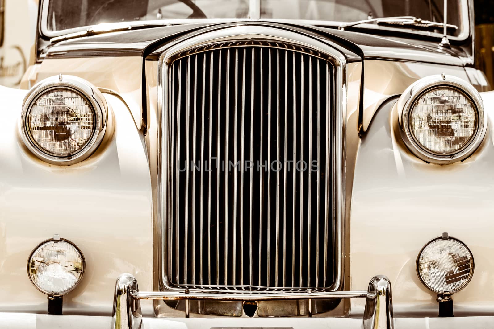 Shiny Antic Silver and Gold Limousine Closeup of the Front