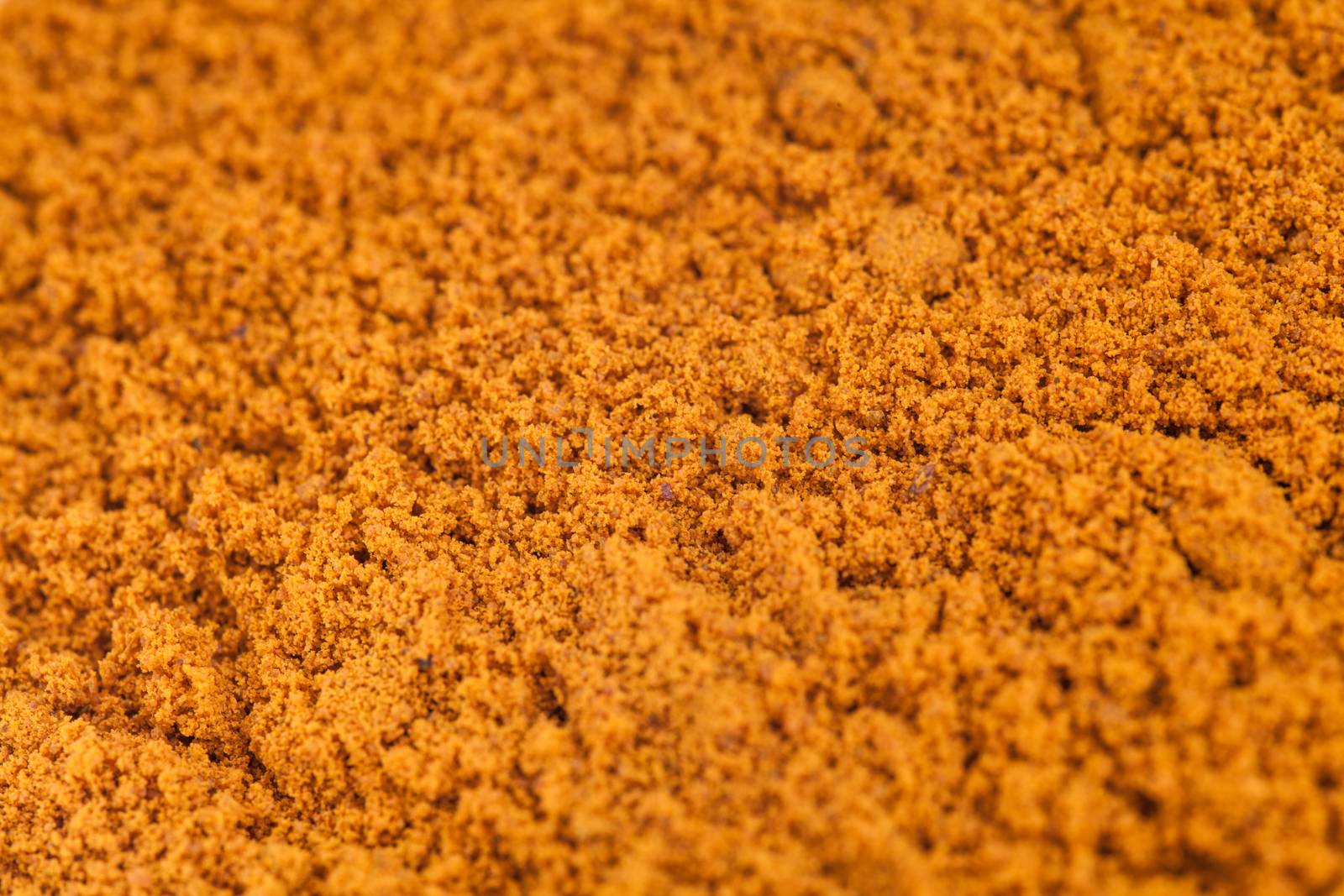 Extreme Closeup of Turmeric Powder Macro Texture