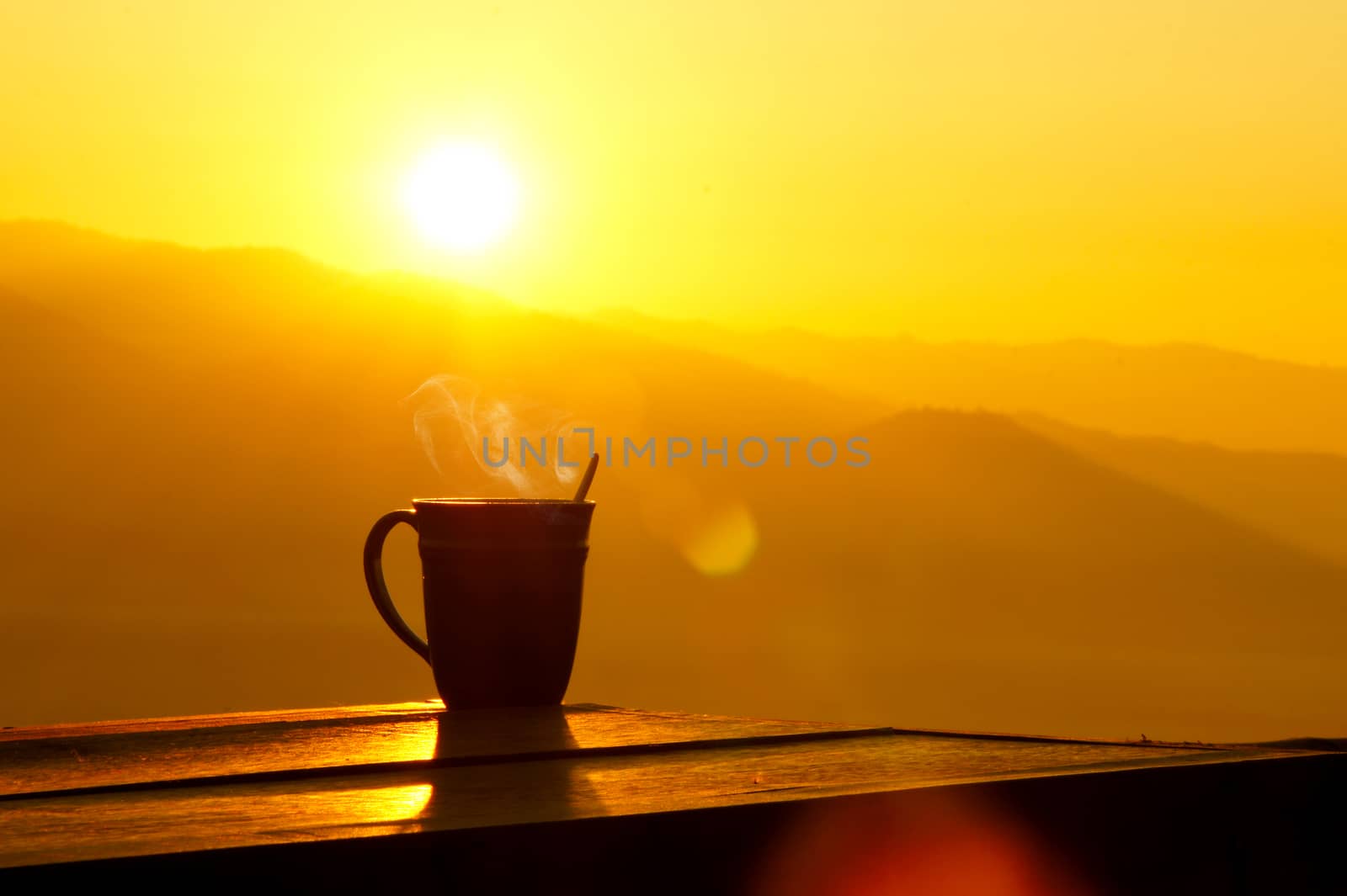 Silhouettes on sunrise morning coffee.