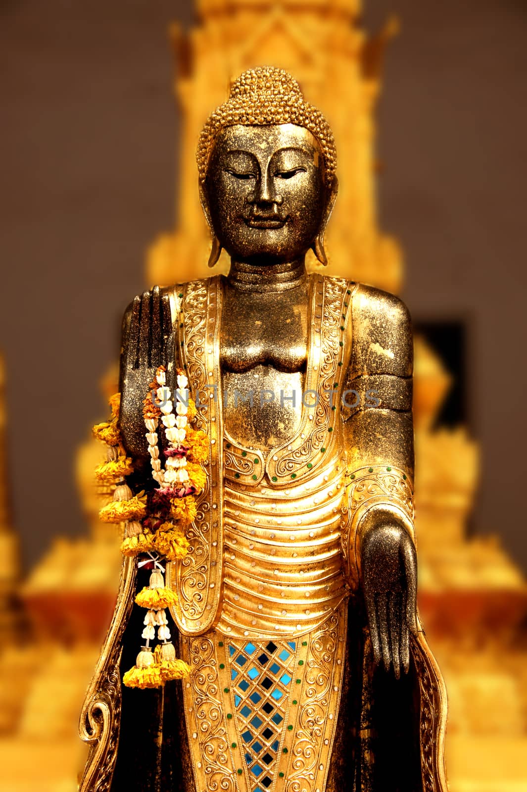 Golden Buddha in Thai temple by Noppharat_th