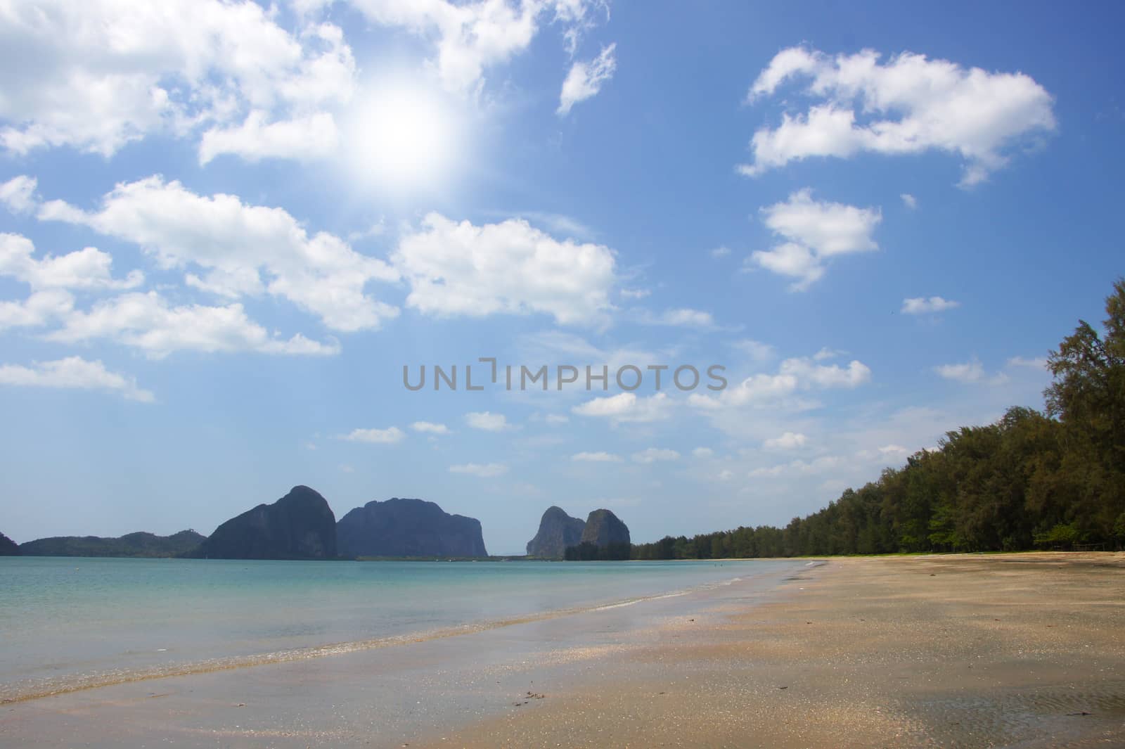 Sand, sea and sky at Pak Meng Beach, Trang Province, Thailand. by Noppharat_th