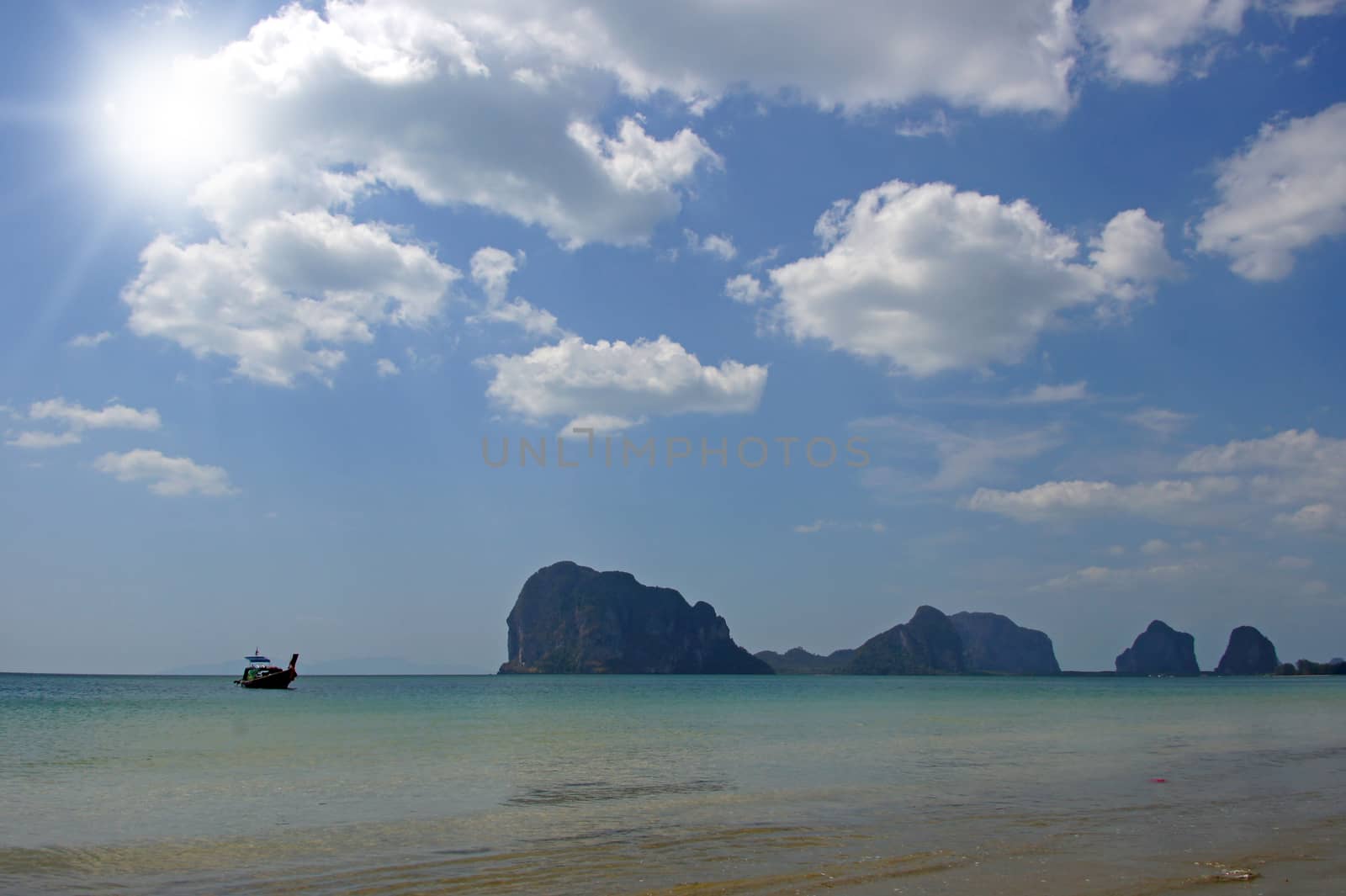 Sand, sea and sky at Pak Meng Beach, Trang Province, Thailand. by Noppharat_th