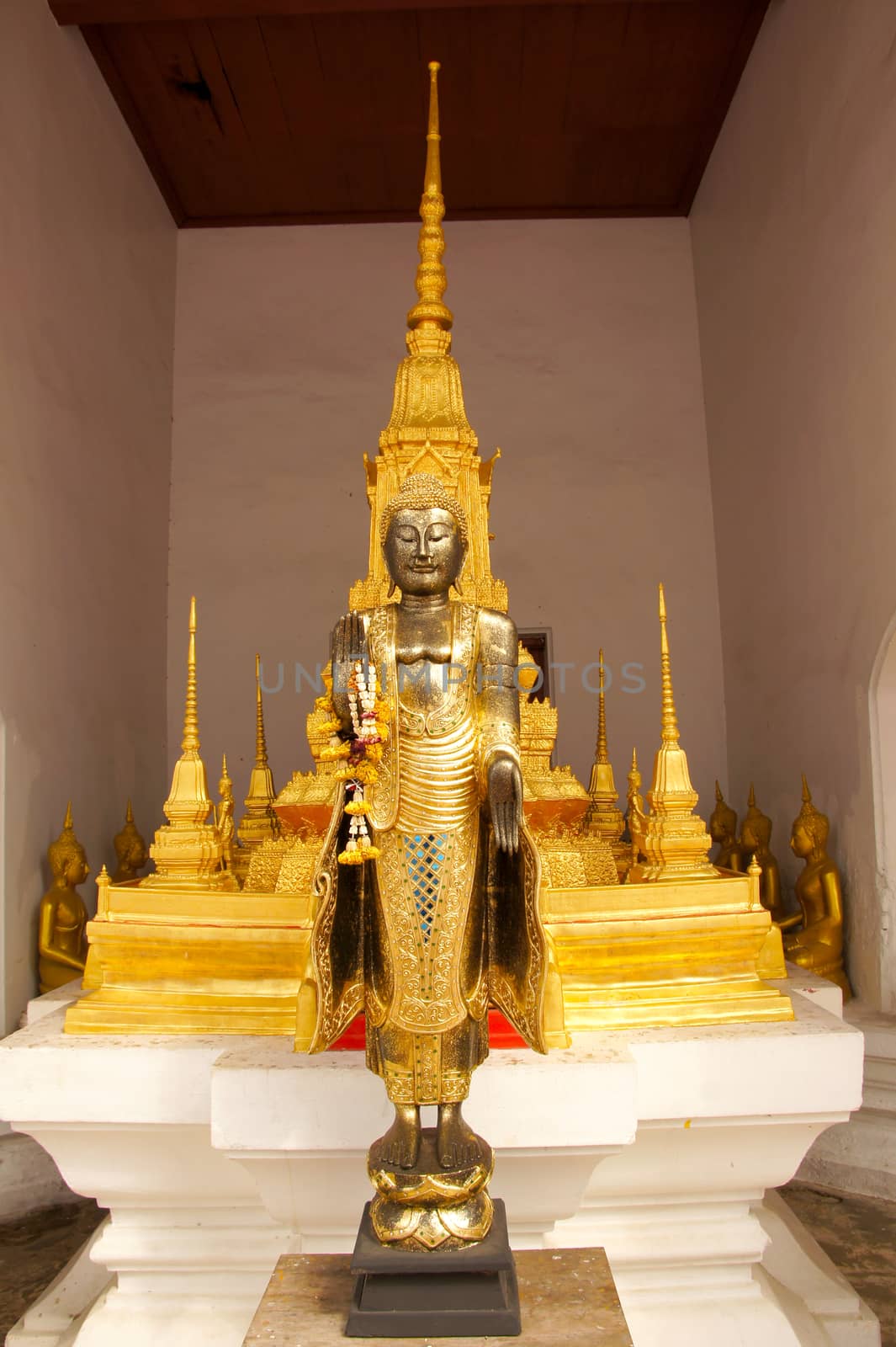 Golden Buddha in Buddhist temple by Noppharat_th