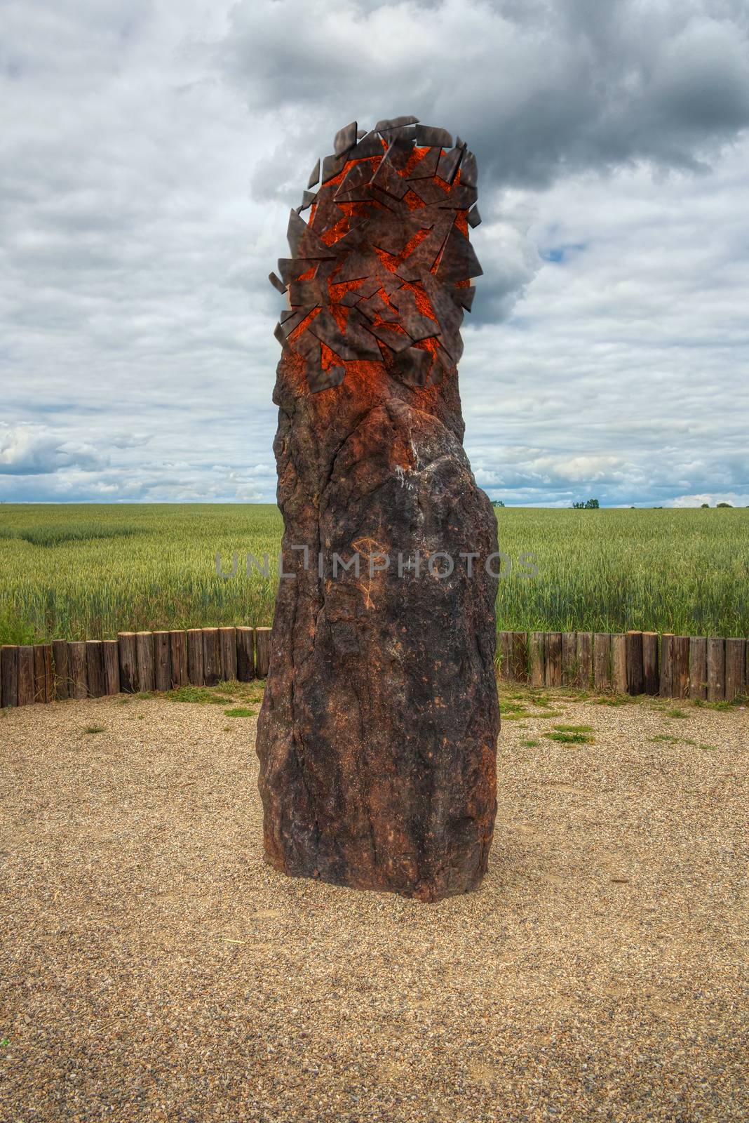 Menhir Stone Shepherd (also Stone Man, Petrified Man or Petrified minister) is a menhir standing alone in a field 1 km northwest of the village Klobuky, district Kladno. This is the highest menhir in the Czech Republic.  3.5 m tall columnar rock uncut dark iron Cretaceous sandstone. This is one of the few stones in the country, which we can with high probability be considered a real prehistoric menhir.