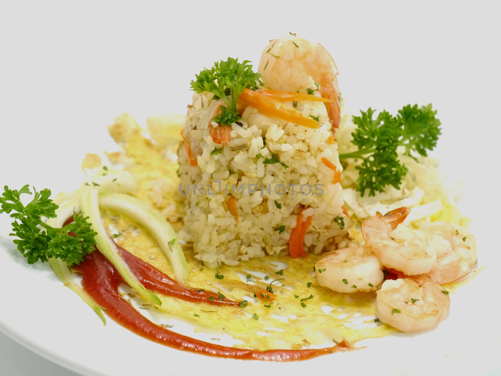 Fried rice with shrimp and parsley leaves.