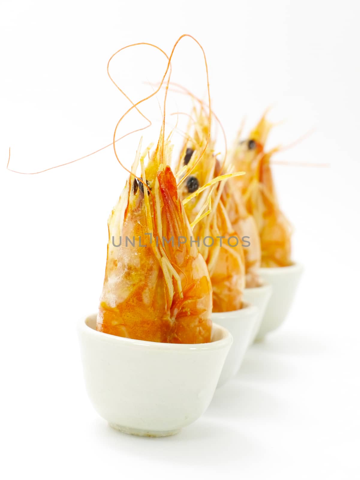 Baked butter shrimp on white background