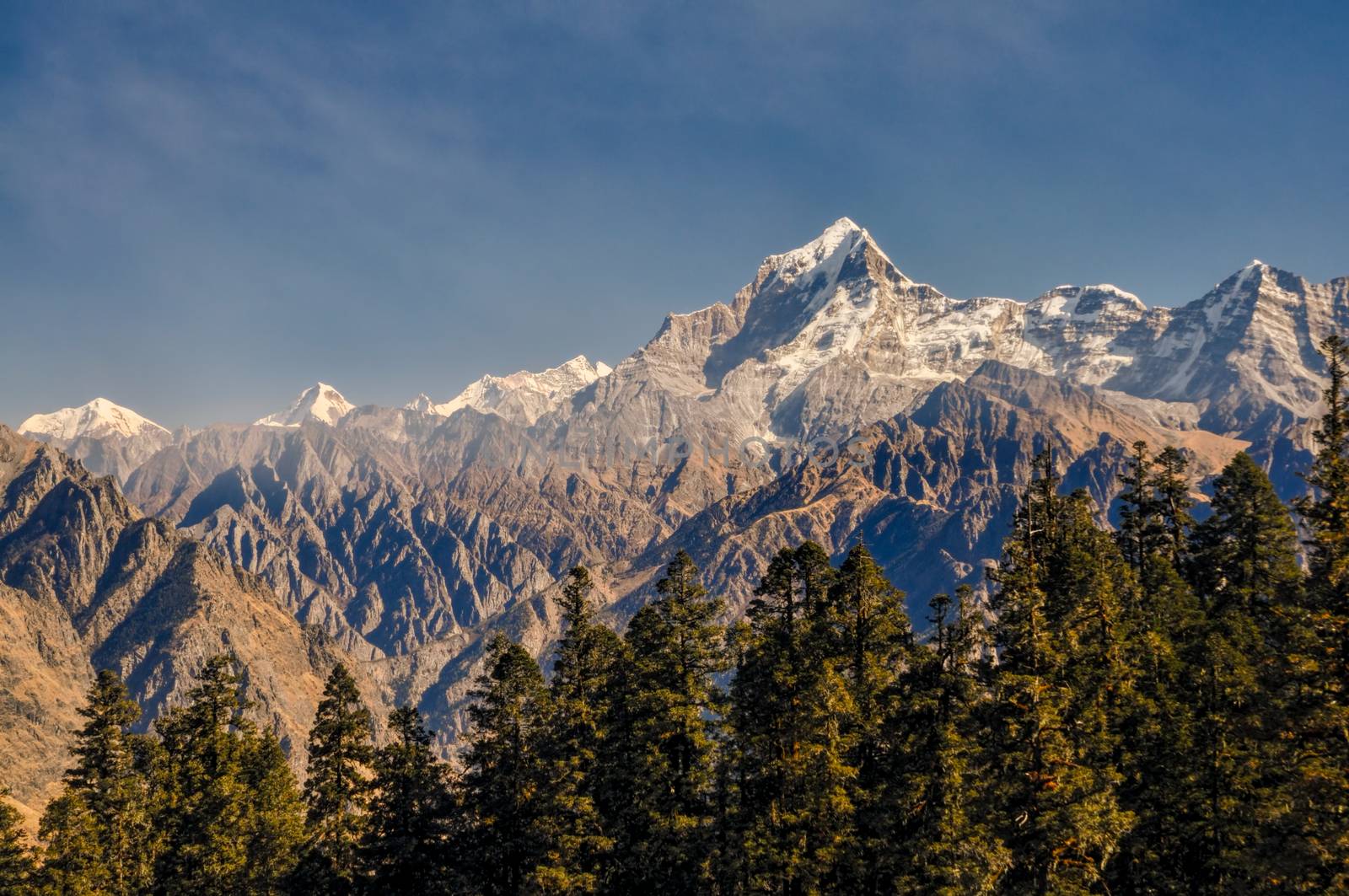 Panoramic view of snow-covered peaks in Kuari Pass, India