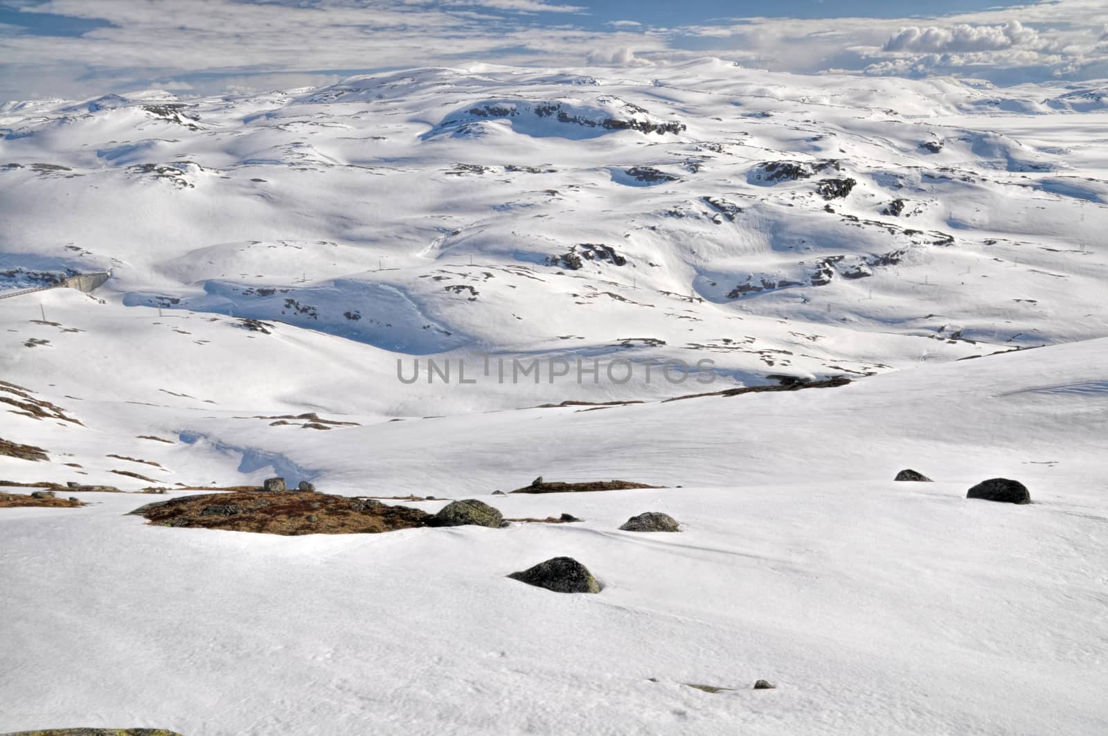 Scenic view of snow covering the slopes near Trolltunga, Norway