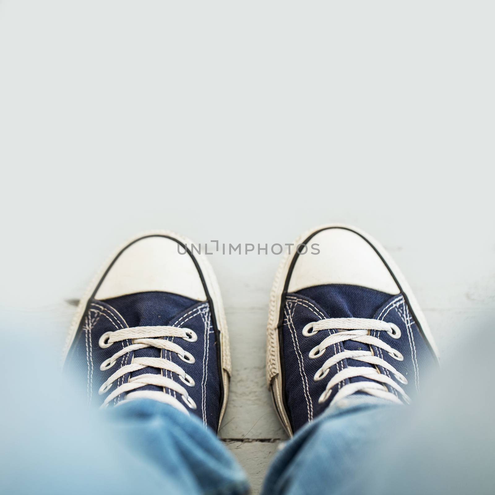 Classic sneakers on the floor