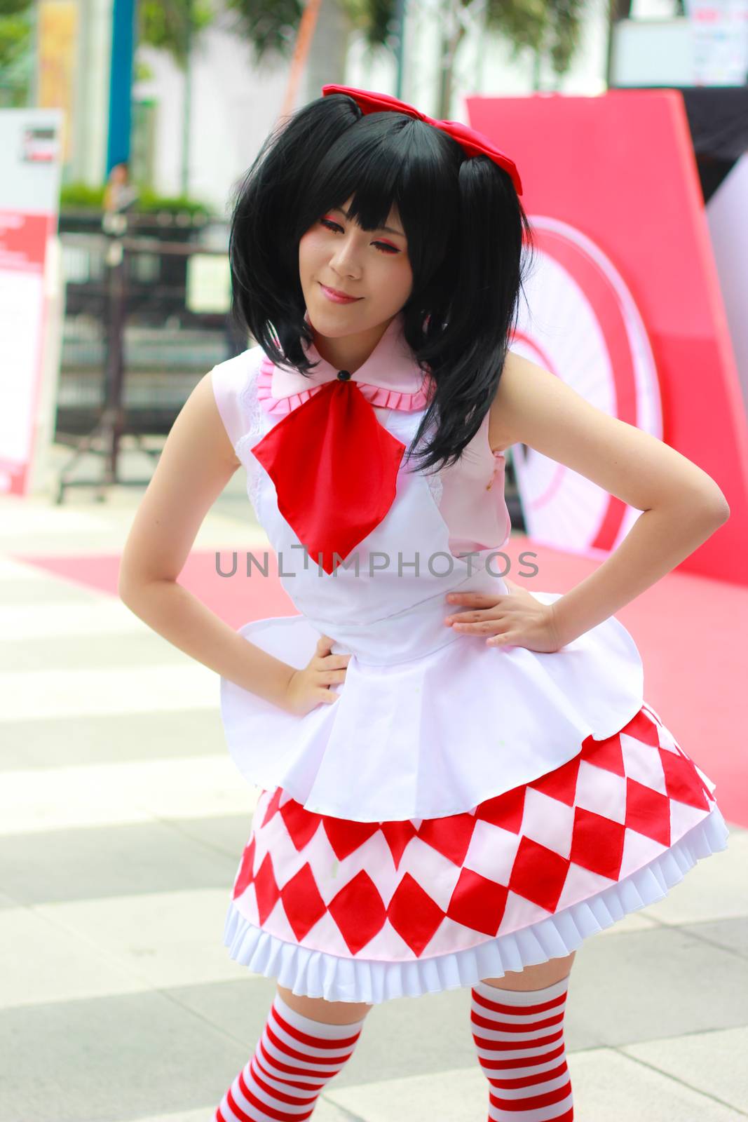 Bangkok - Aug 31: An unidentified Japanese anime cosplay pose  on August 31, 2014 at Central World, Bangkok, Thailand.