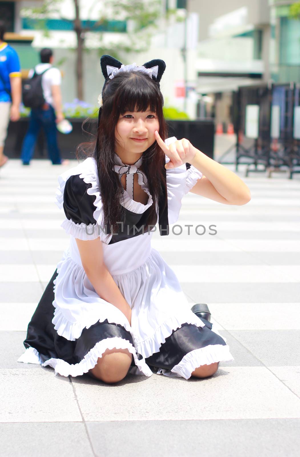 Bangkok - Aug 31: An unidentified Japanese anime cosplay pose  on August 31, 2014 at Central World, Bangkok, Thailand.