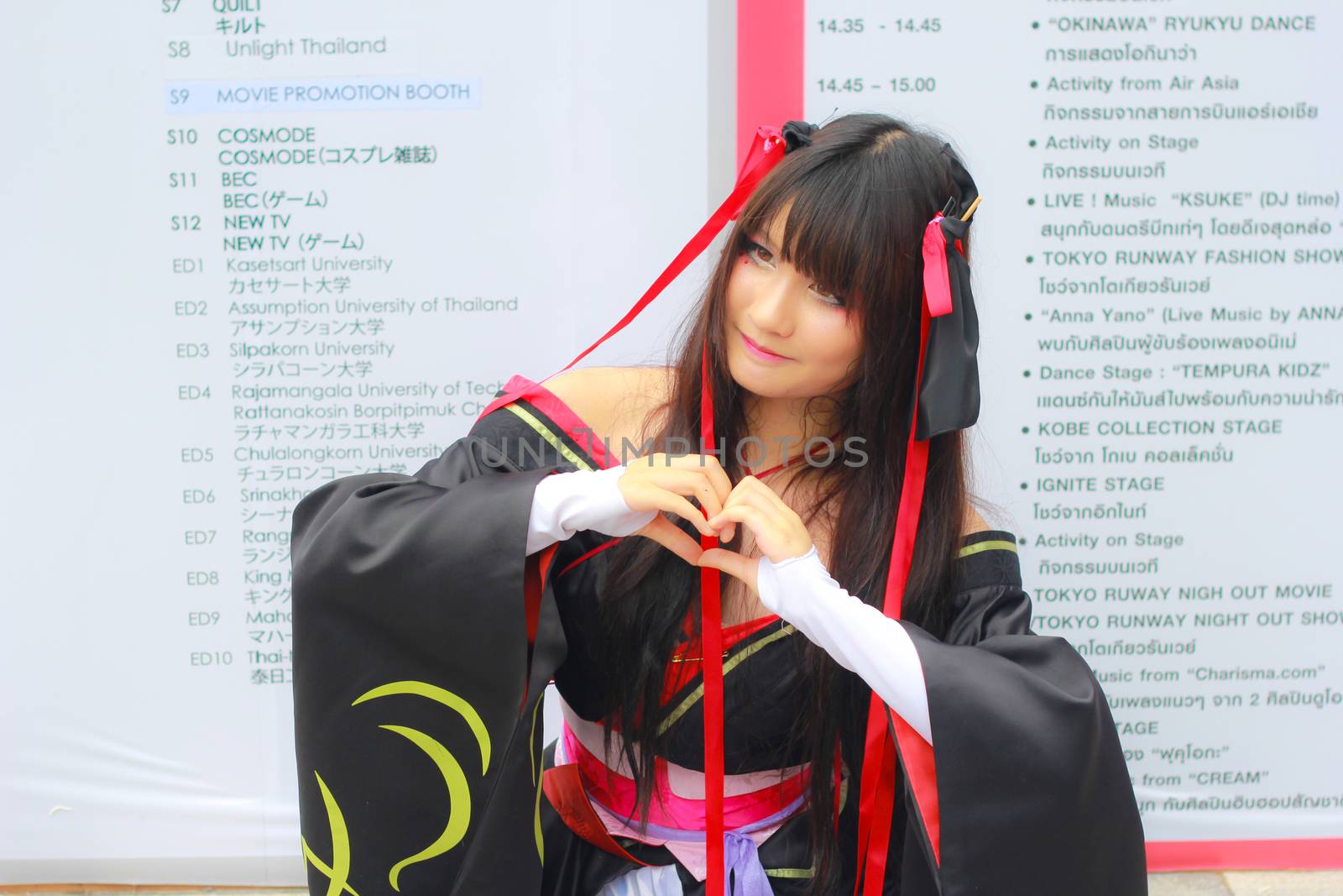 Bangkok - Aug 31: An unidentified Japanese anime cosplay pose  on August 31, 2014 at Central World, Bangkok, Thailand.