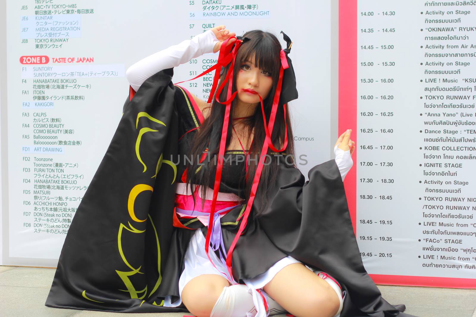 Bangkok - Aug 31: An unidentified Japanese anime cosplay pose  on August 31, 2014 at Central World, Bangkok, Thailand.