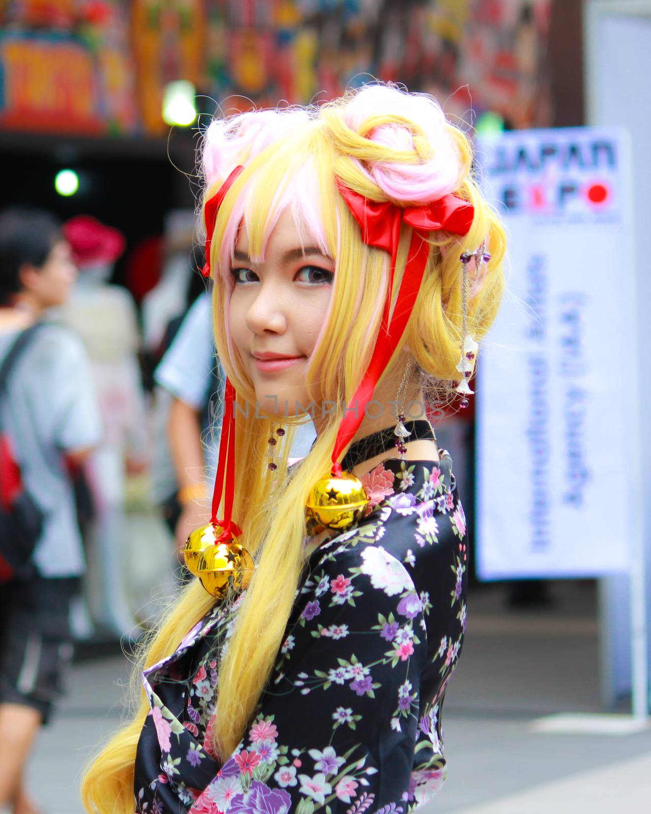 Bangkok - Aug 31: An unidentified Japanese anime cosplay pose  on August 31, 2014 at Central World, Bangkok, Thailand.