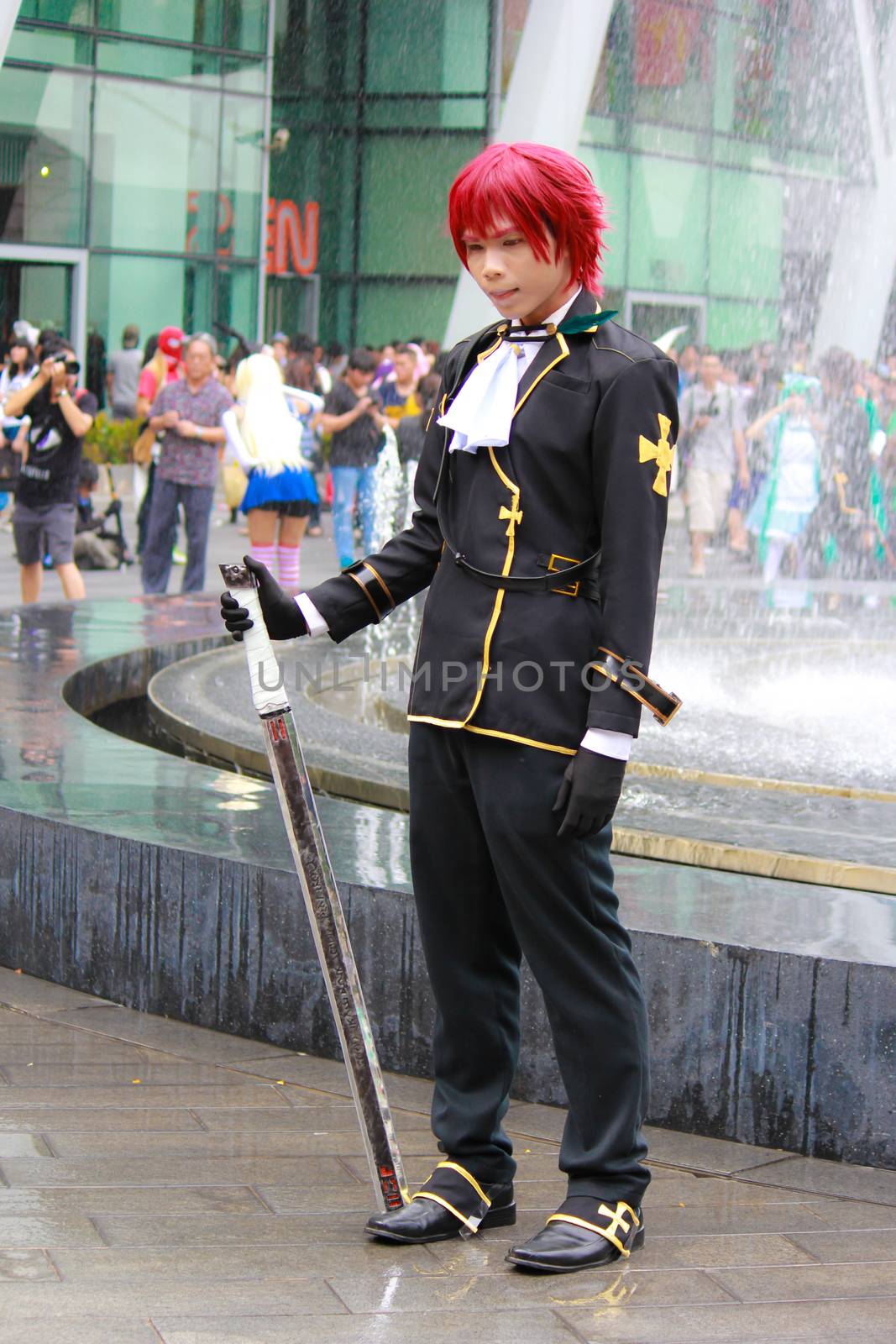 Bangkok - Aug 31: An unidentified Japanese anime cosplay pose  on August 31, 2014 at Central World, Bangkok, Thailand.